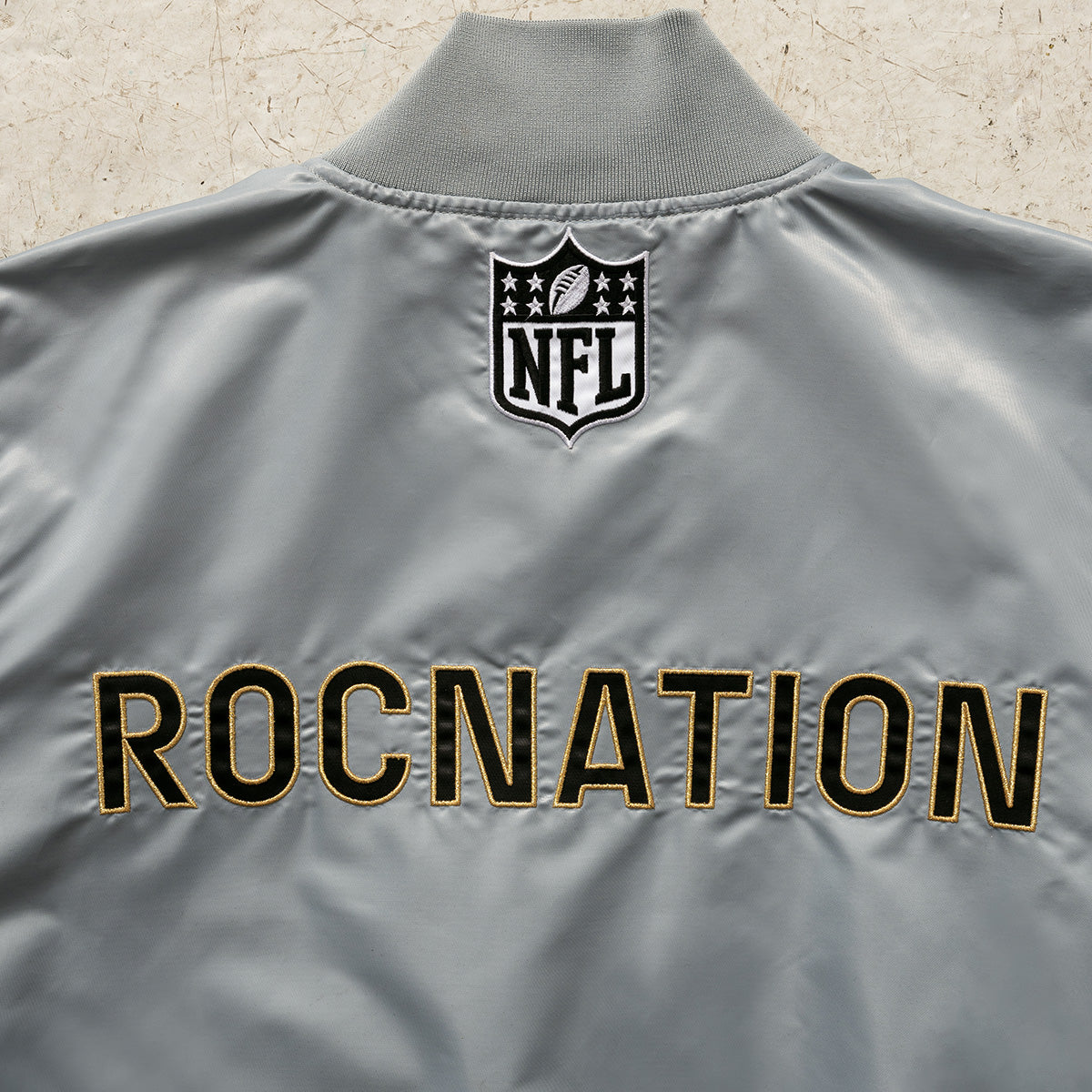 Roc Nation x NFL Starter Breaker Jacket